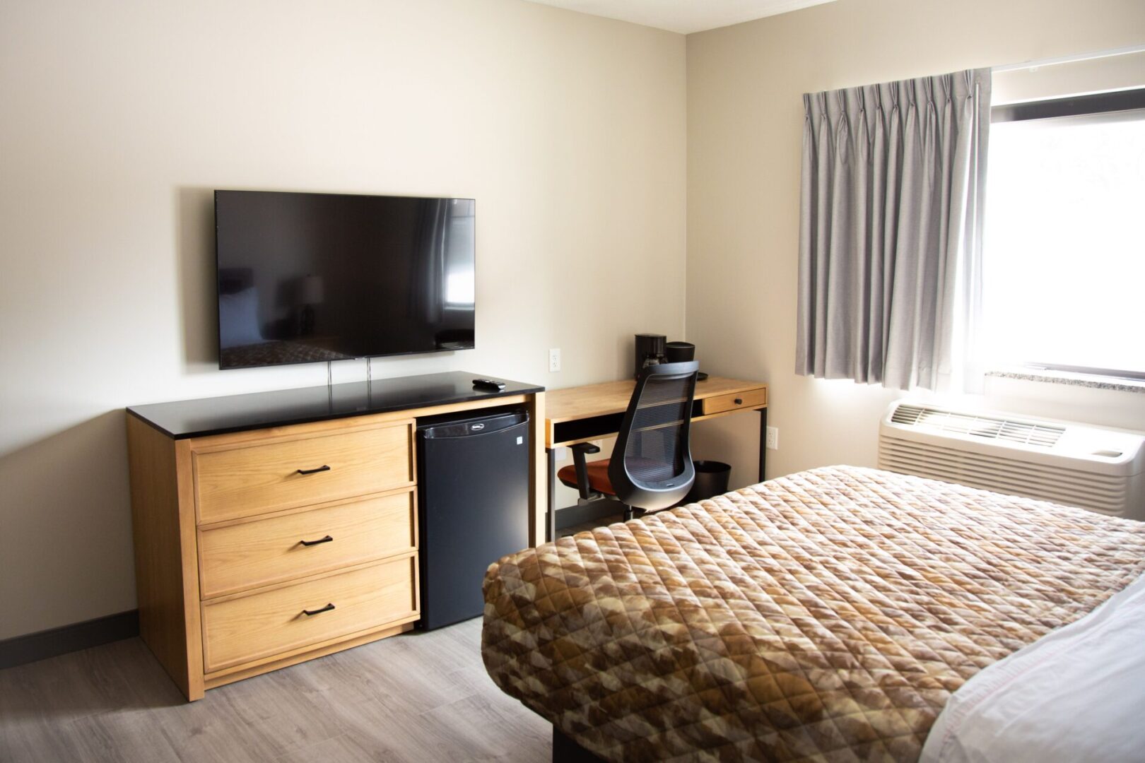 bed with drawer and tv